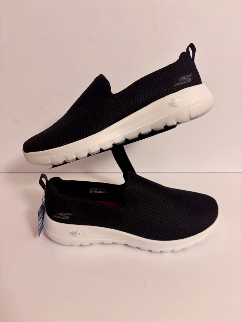 Skechers Black Slip-On Athletic Sneakers with White Sole size 9 wide